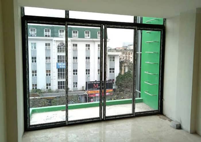 Cửa đi lùa 4 cánh nhôm việt pháp hệ 2600 màu cafe