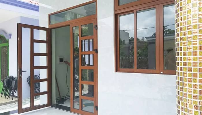 Cửa nhôm xingfa vân gỗ đẹp lắp đặt tại hà nội